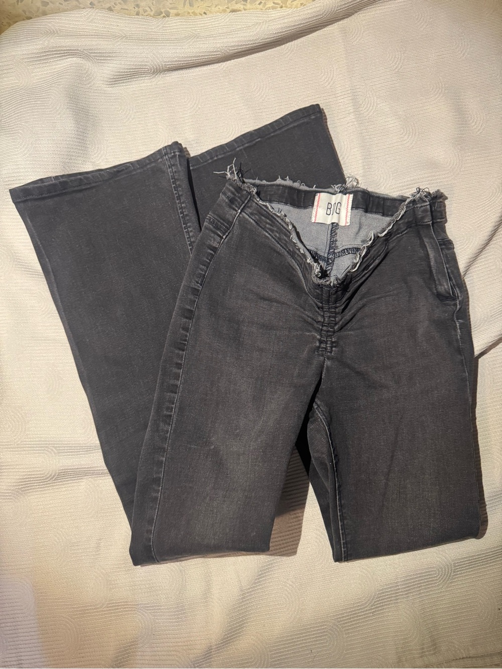 BDG Black Washed High-Rise Flare Jeans with Raw Waist